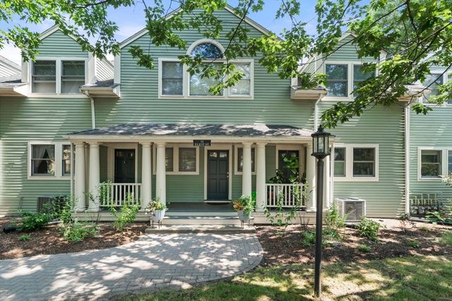 a view of a house with a garden