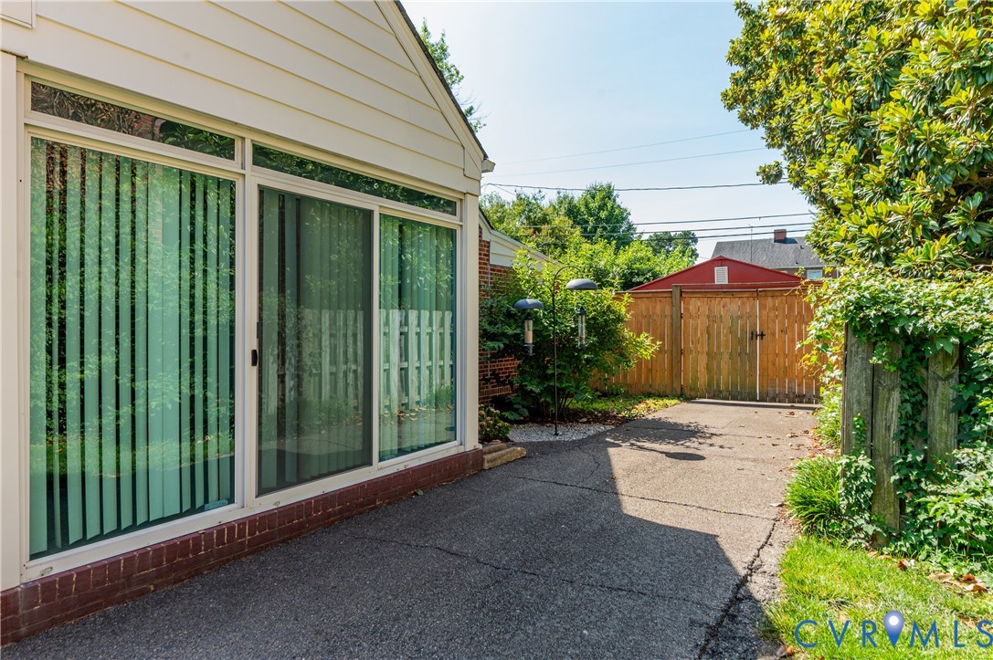 2107 Lennox Road Henrico, VA 23228 - Photo 47 of 47 Siding exterior with a large sliding glass door an