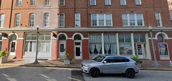 a car parked in front of a building