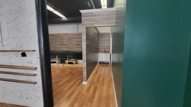 a balcony with view of living room