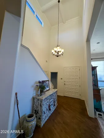 a view of a livingroom with furniture and hardwood floor