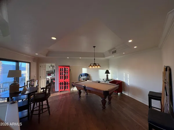 a room with furniture and a wooden floor
