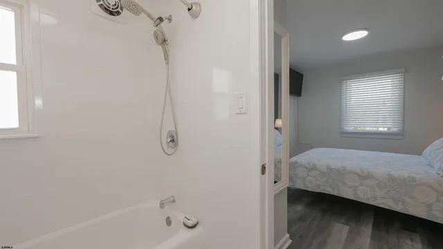 a view of a patio with table and chairs and potted plants