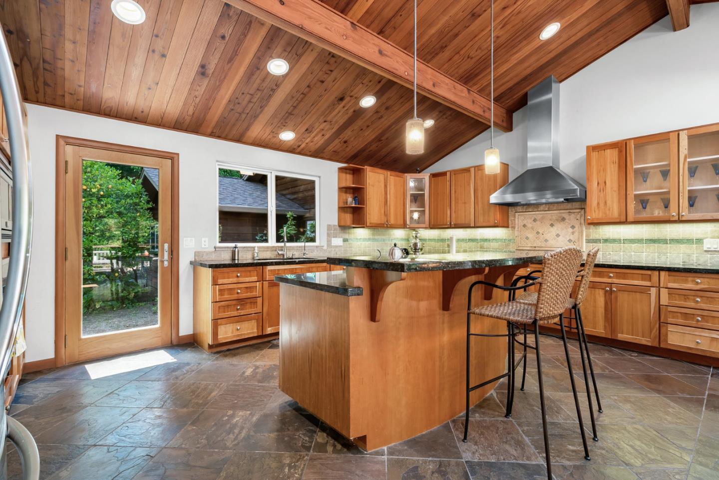 111 Carter Road Santa Cruz, CA 95060 - Photo 21 of 64 a dining table with chairs and kitchen view