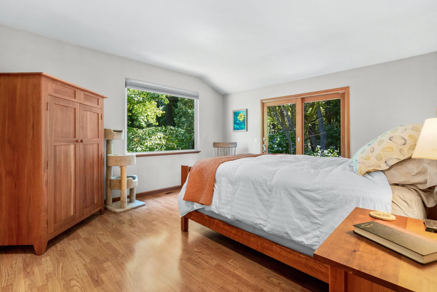 111 Carter Road Santa Cruz, CA 95060 - Photo 24 of 64 a bed sitting in a bedroom next to a window