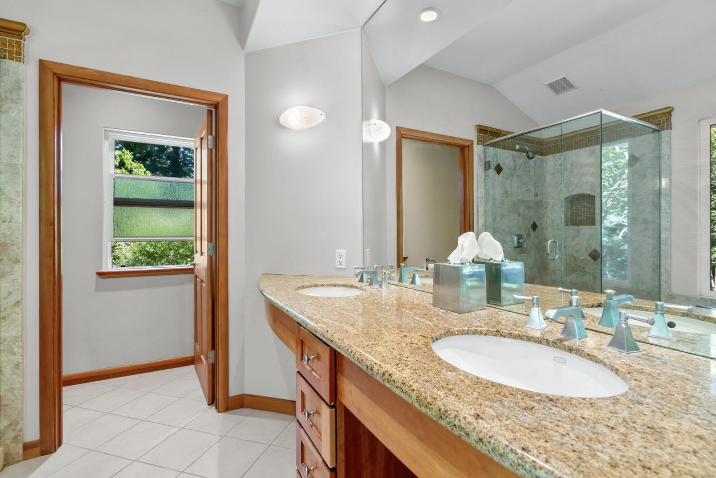 111 Carter Road Santa Cruz, CA 95060 - Photo 29 of 64 a bathroom with a granite countertop sink and a mirror