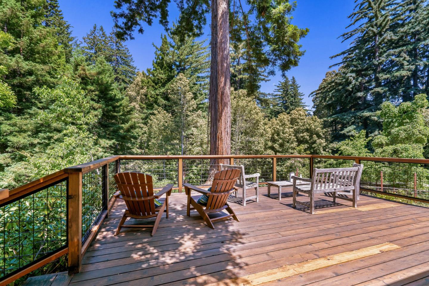 111 Carter Road Santa Cruz, CA 95060 - Photo 45 of 64 a view of a chairs and table on the wooden deck