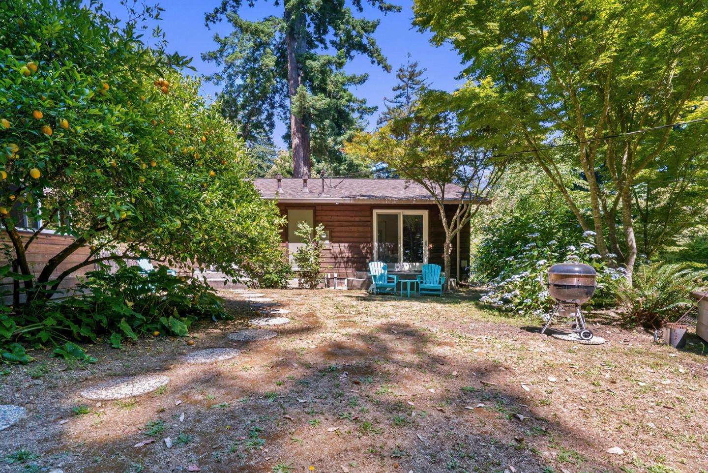 111 Carter Road Santa Cruz, CA 95060 - Photo 52 of 64 a front view of a house with yard patio and outdoor seating