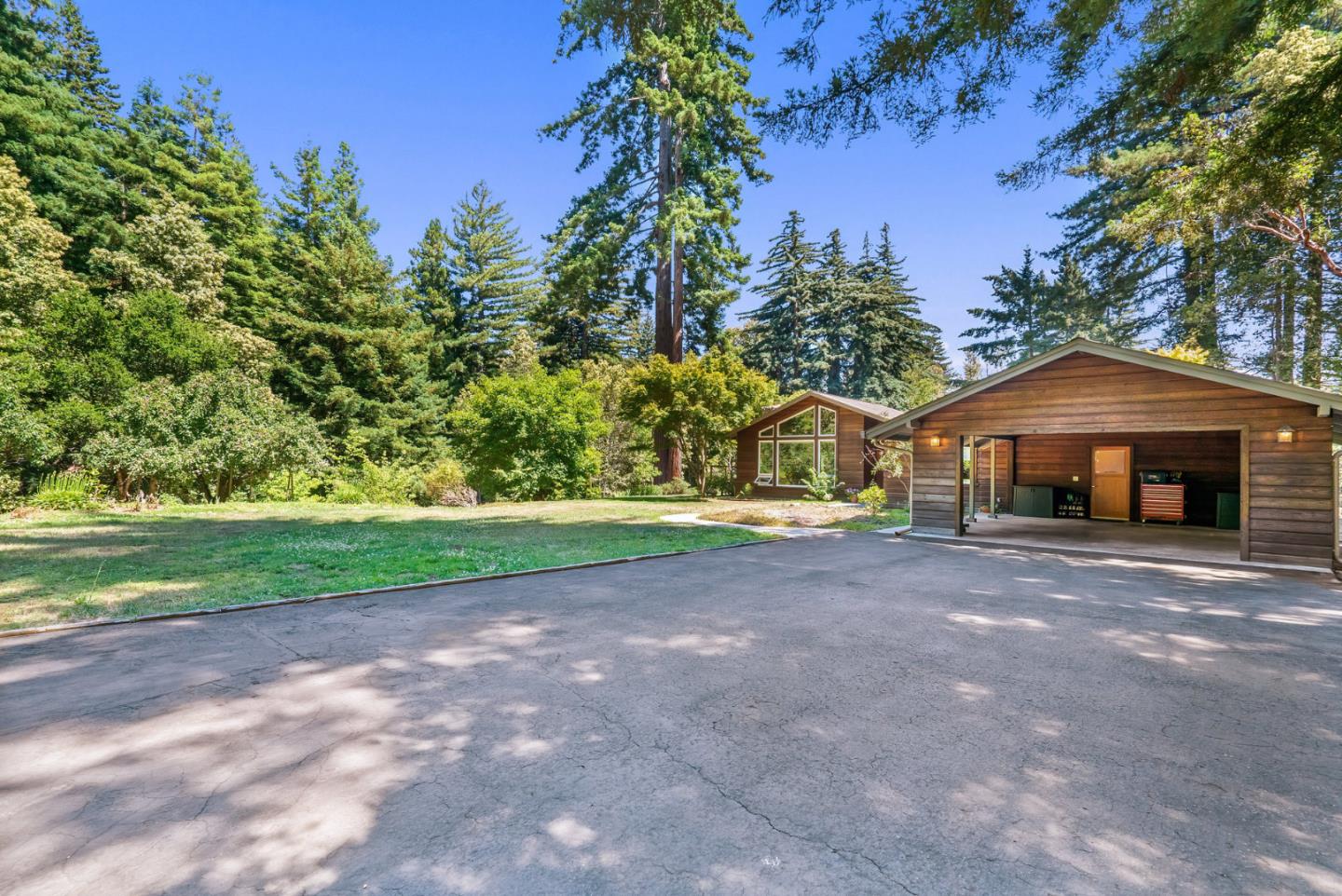 111 Carter Road Santa Cruz, CA 95060 - Photo 63 of 64 a front view of a house with a yard and a garage