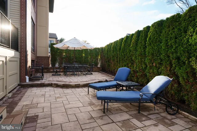 a view of a chairs and tables in the patio
