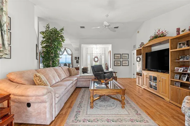 a view of a living room and dining room