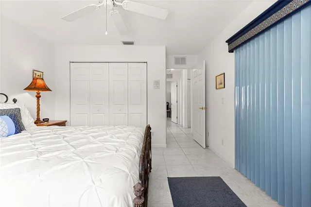 a view of a hallway with paintings on the wall