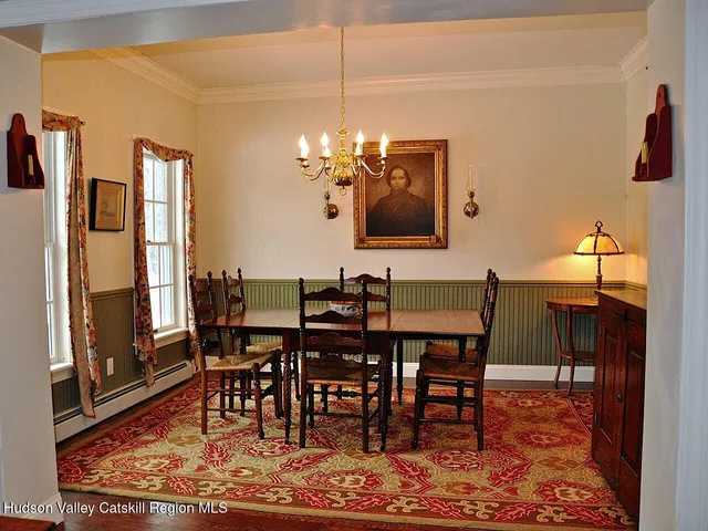 a view of a dining room with furniture