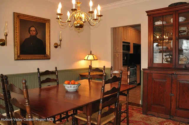 a view of a dining room with furniture