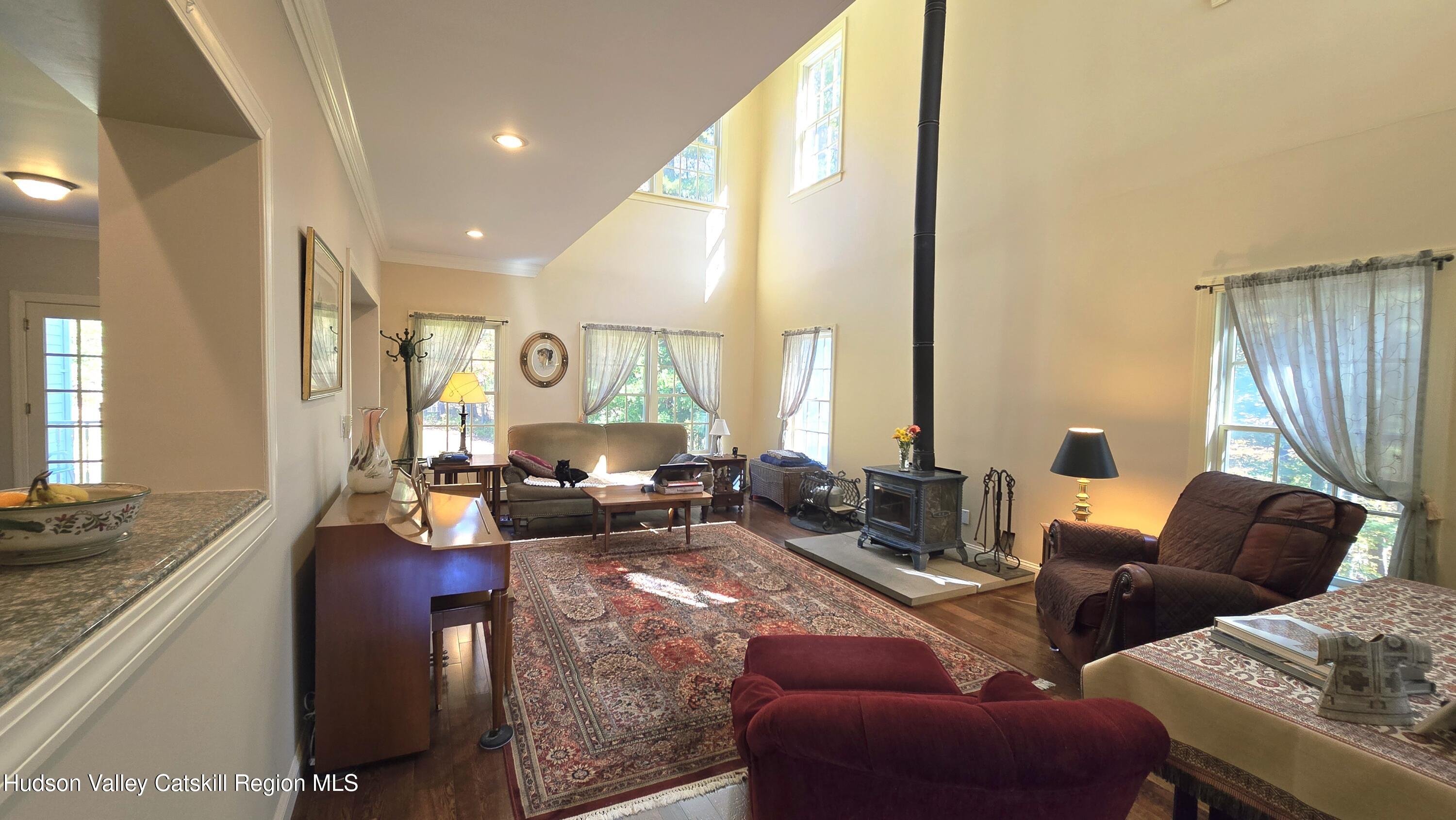 3124-3100 County Rte 9 Canaan, NY 12060 - Photo 17 of 45 a living room with furniture and a large window