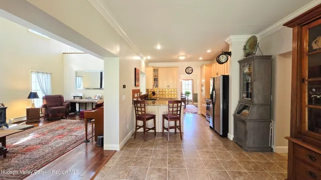 a lobby with furniture and a view of living room