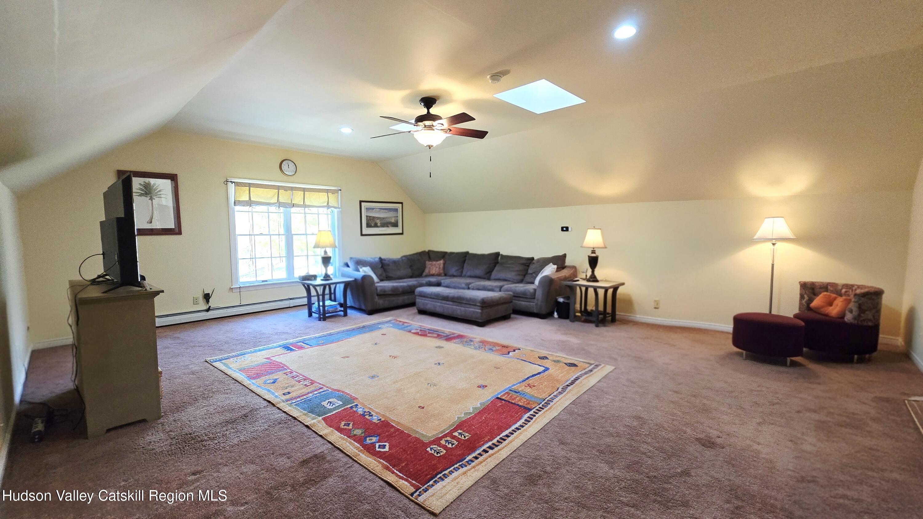 3124-3100 County Rte 9 Canaan, NY 12060 - Photo 34 of 45 a living room with furniture rug and window