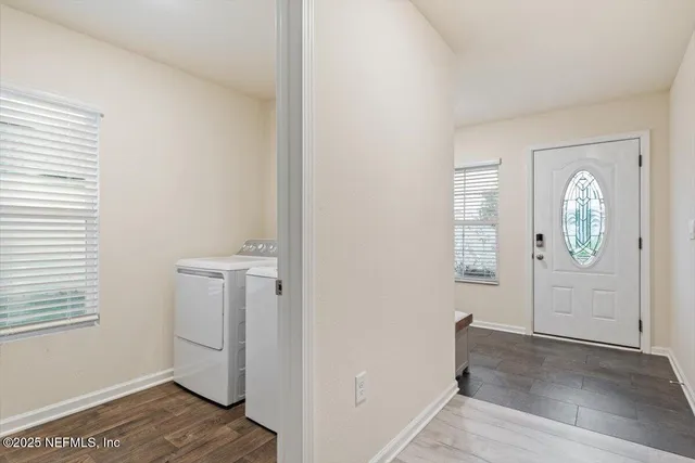 a view of a livingroom and dining room