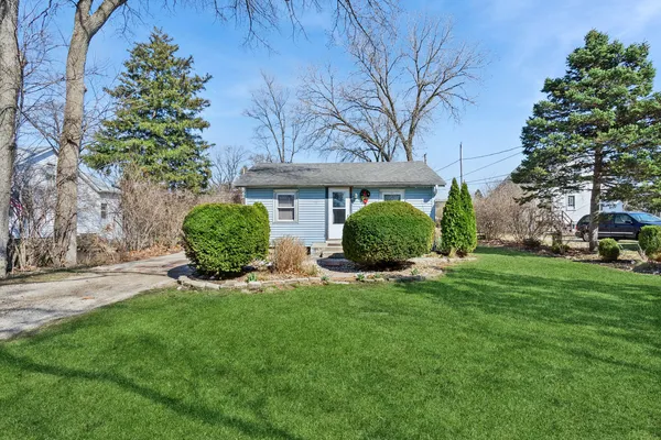 a view of a house with a back yard