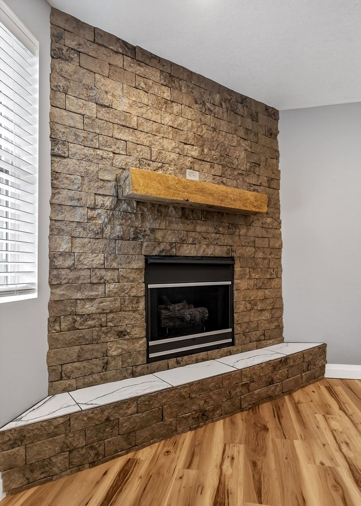 365 Spring Haven Lane Sparta, TN 38583 - Photo 13 of 60 a view of empty room with wooden floor and fireplace