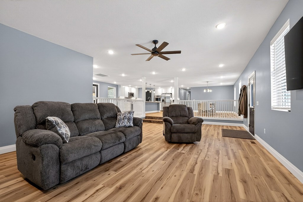 365 Spring Haven Lane Sparta, TN 38583 - Photo 14 of 60 a living room with furniture and a chandelier