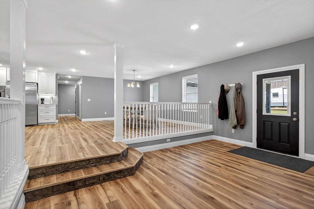 365 Spring Haven Lane Sparta, TN 38583 - Photo 15 of 60 a very nice looking room with wooden floor and windows