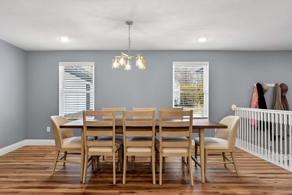 365 Spring Haven Lane Sparta, TN 38583 - Photo 16 of 60 a view of a dining room with furniture wooden floor and chandelier