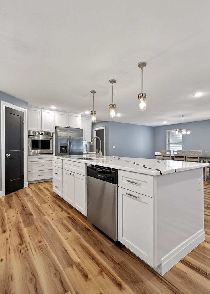 365 Spring Haven Lane Sparta, TN 38583 - Photo 21 of 60 a kitchen with cabinets and stainless steel appliances