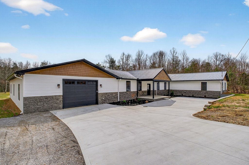 365 Spring Haven Lane Sparta, TN 38583 - Photo 3 of 60 a view of a house with a yard
