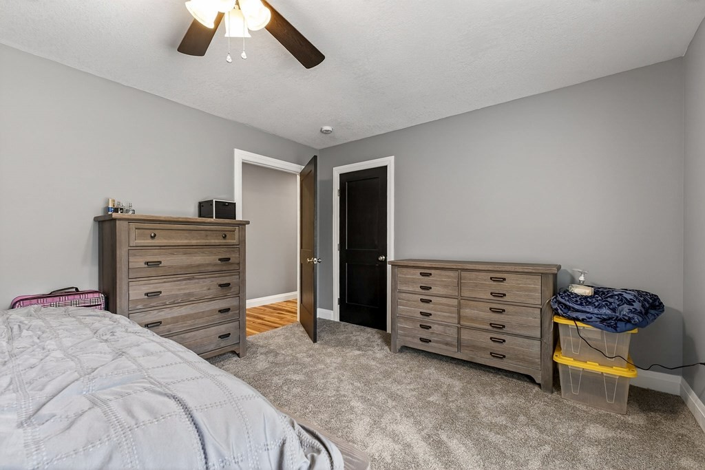365 Spring Haven Lane Sparta, TN 38583 - Photo 37 of 60 a bedroom with a bed and a cabinets
