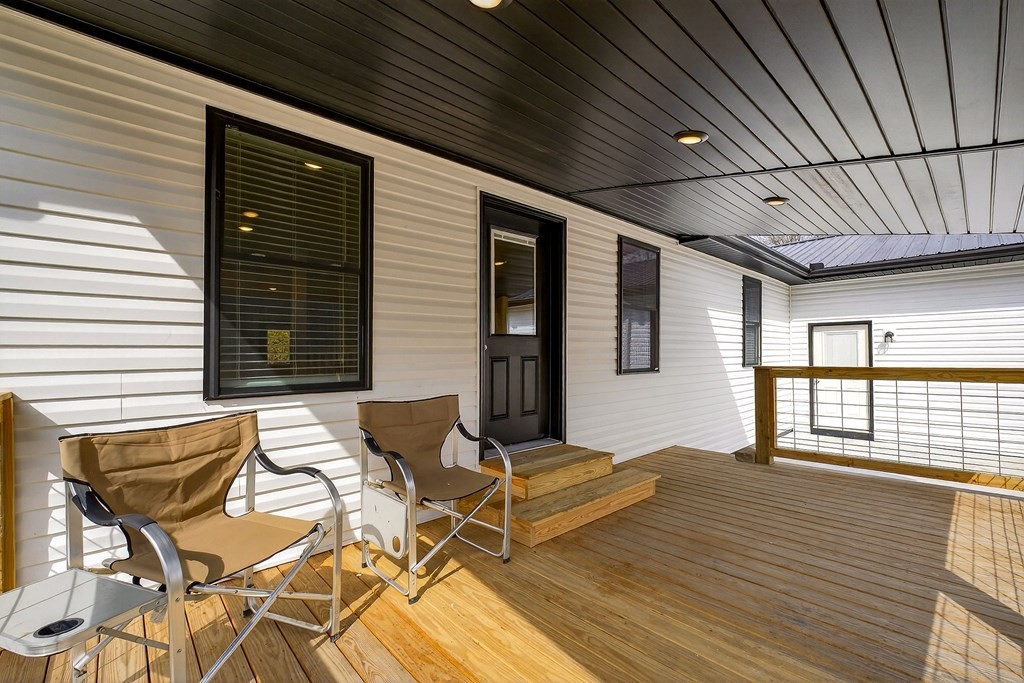 365 Spring Haven Lane Sparta, TN 38583 - Photo 56 of 60 a view of balcony with wooden floor and glass door