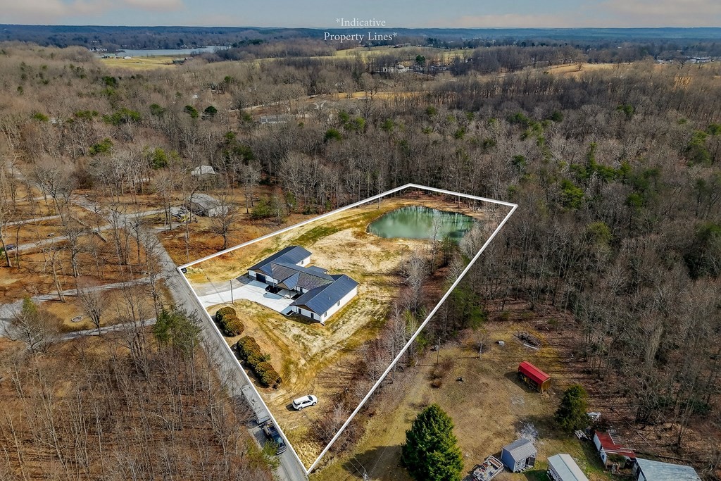 365 Spring Haven Lane Sparta, TN 38583 - Photo 9 of 60 a view of a backyard with mountain view and wooden floor