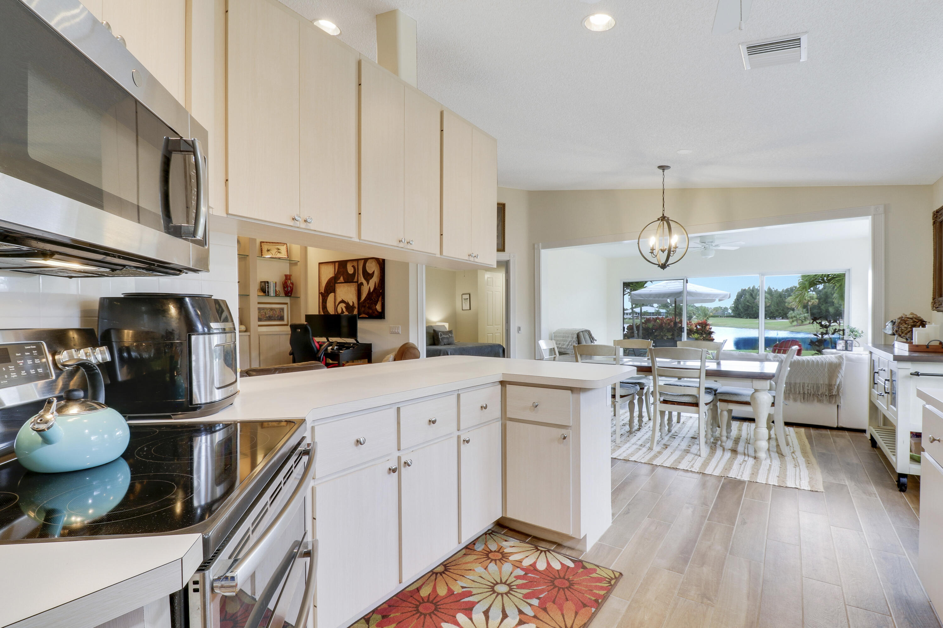 175 Brier Circle Jupiter, FL 33458 - Photo 12 of 39 Kitchen and Dining Space