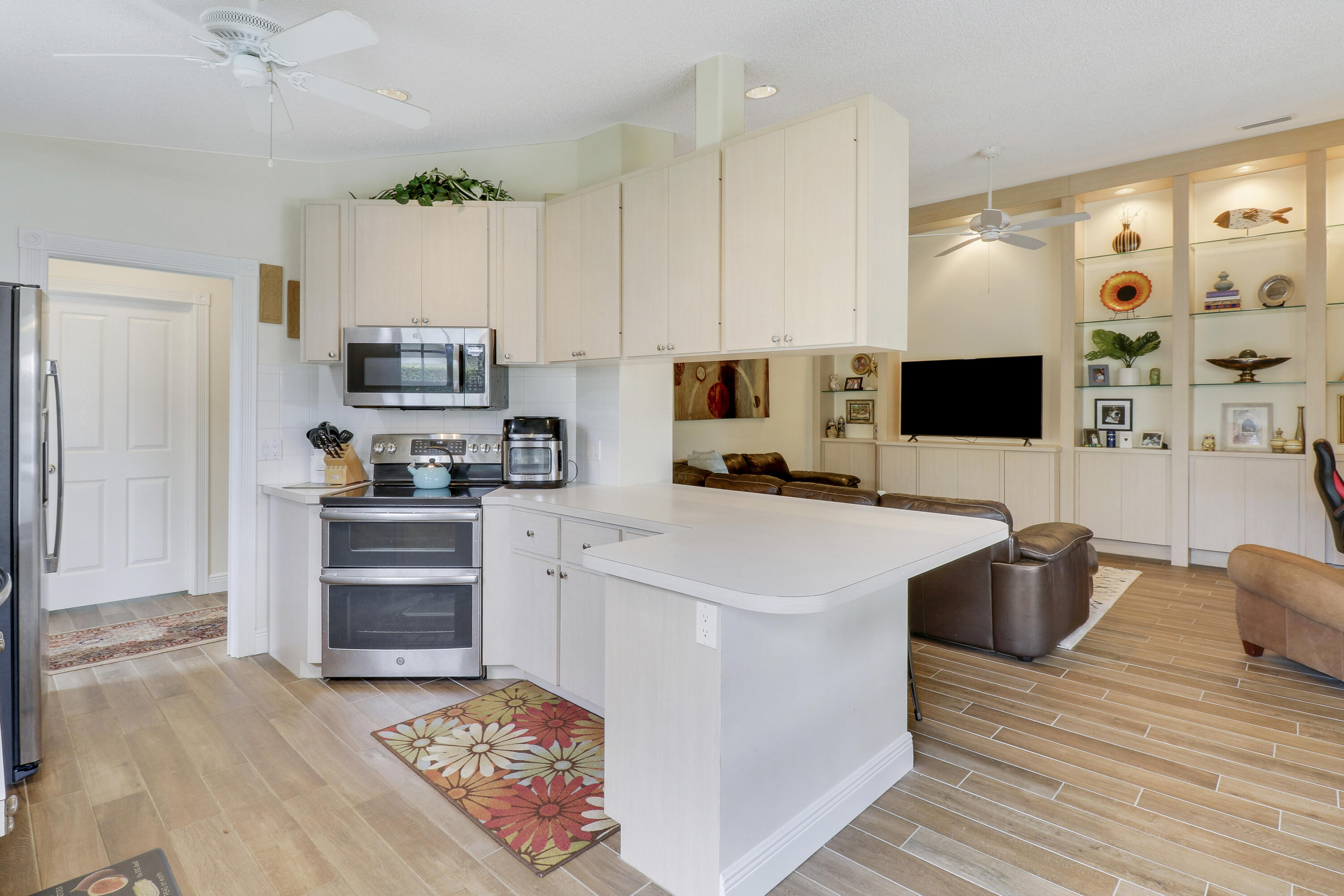 175 Brier Circle Jupiter, FL 33458 - Photo 13 of 39 Kitchen Open to Living Room