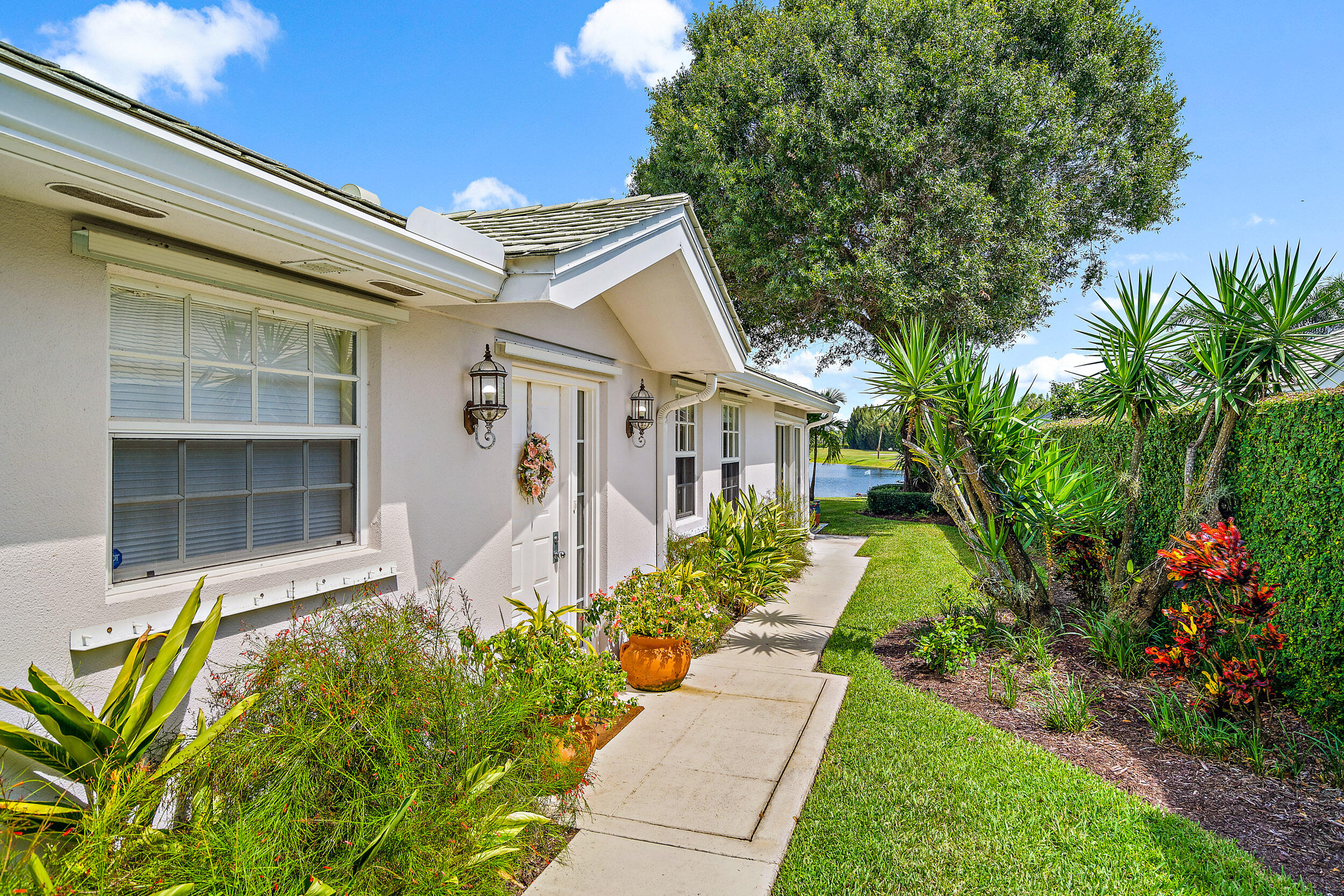 175 Brier Circle Jupiter, FL 33458 - Photo 4 of 39 Welcoming Side Entrance