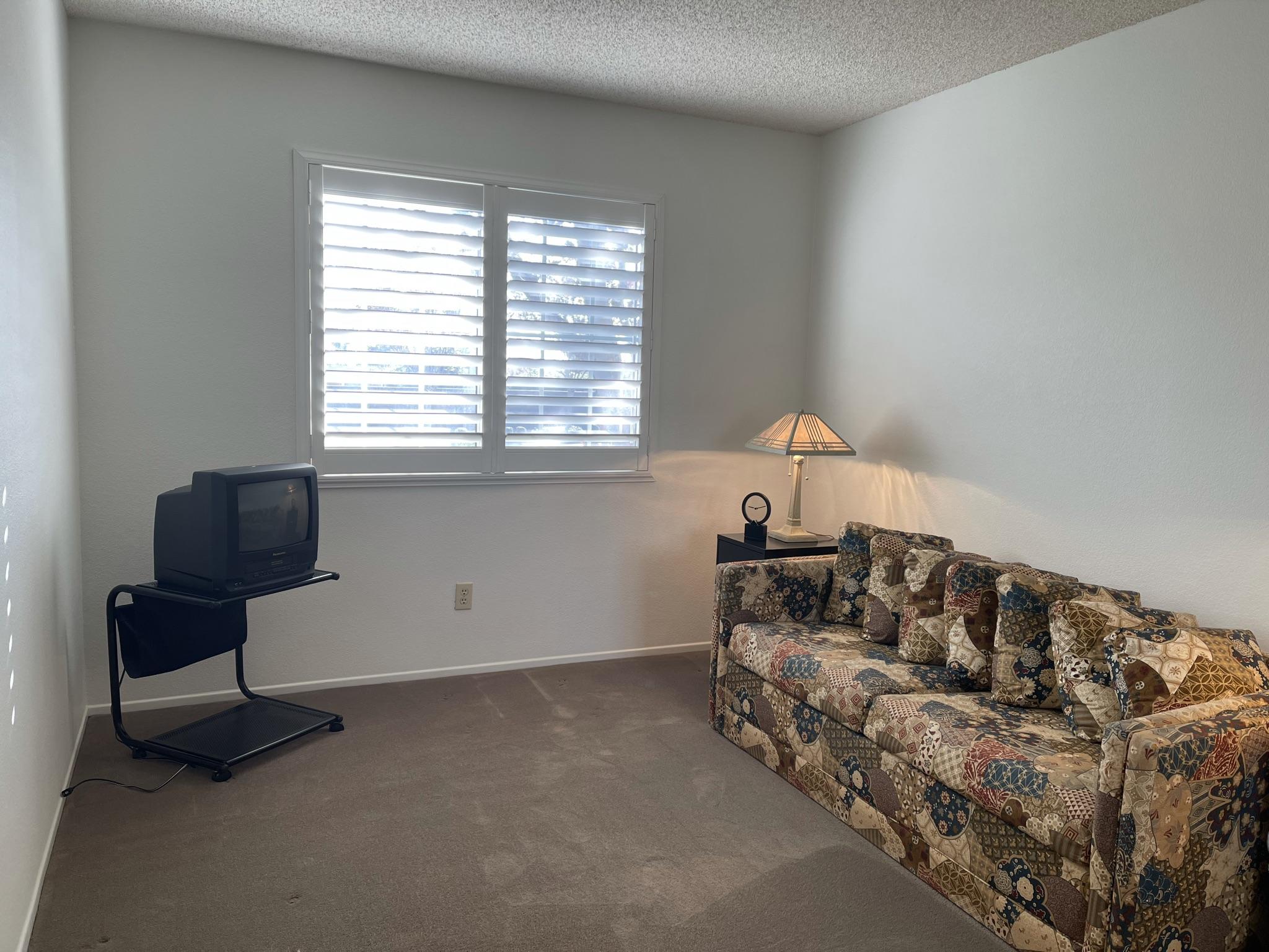 9661 Northampton Drive Rancho Cucamonga, CA 91737 - Photo 11 of 27 a living room with furniture and a window