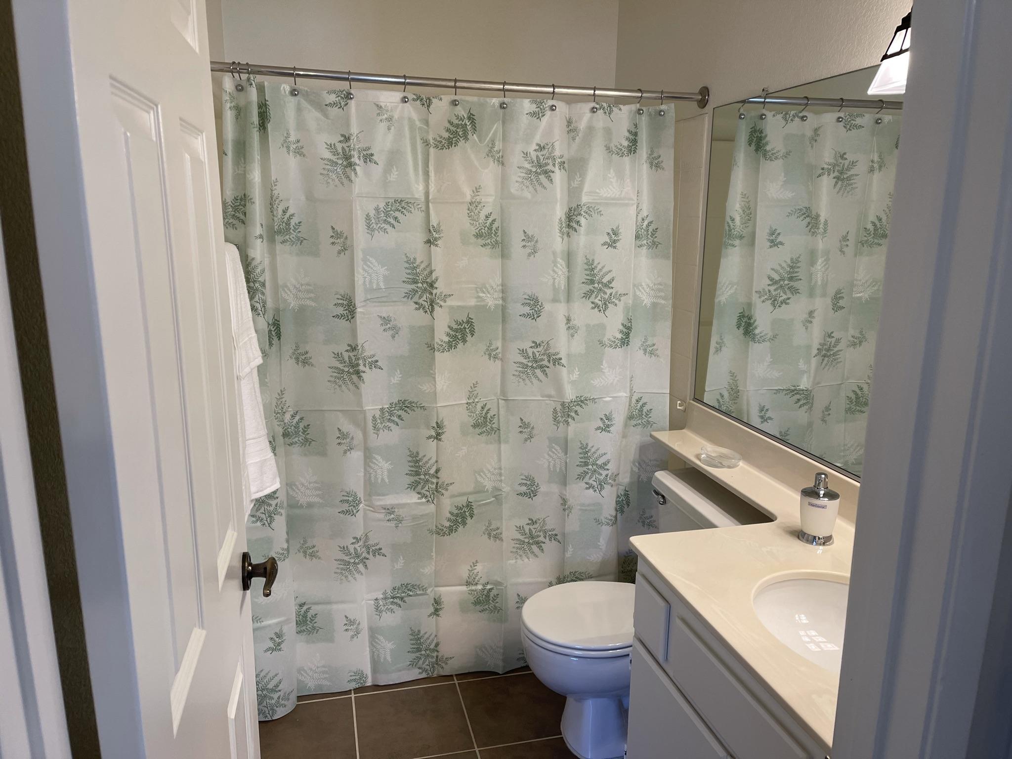 9661 Northampton Drive Rancho Cucamonga, CA 91737 - Photo 12 of 27 a bathroom with a sink and a shower