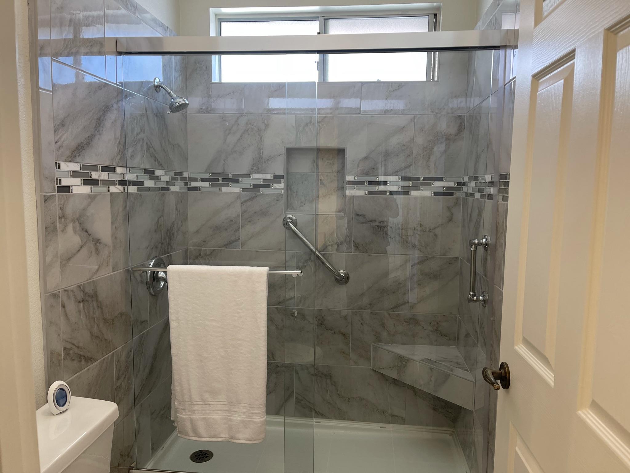 9661 Northampton Drive Rancho Cucamonga, CA 91737 - Photo 16 of 27 a bathroom with a shower