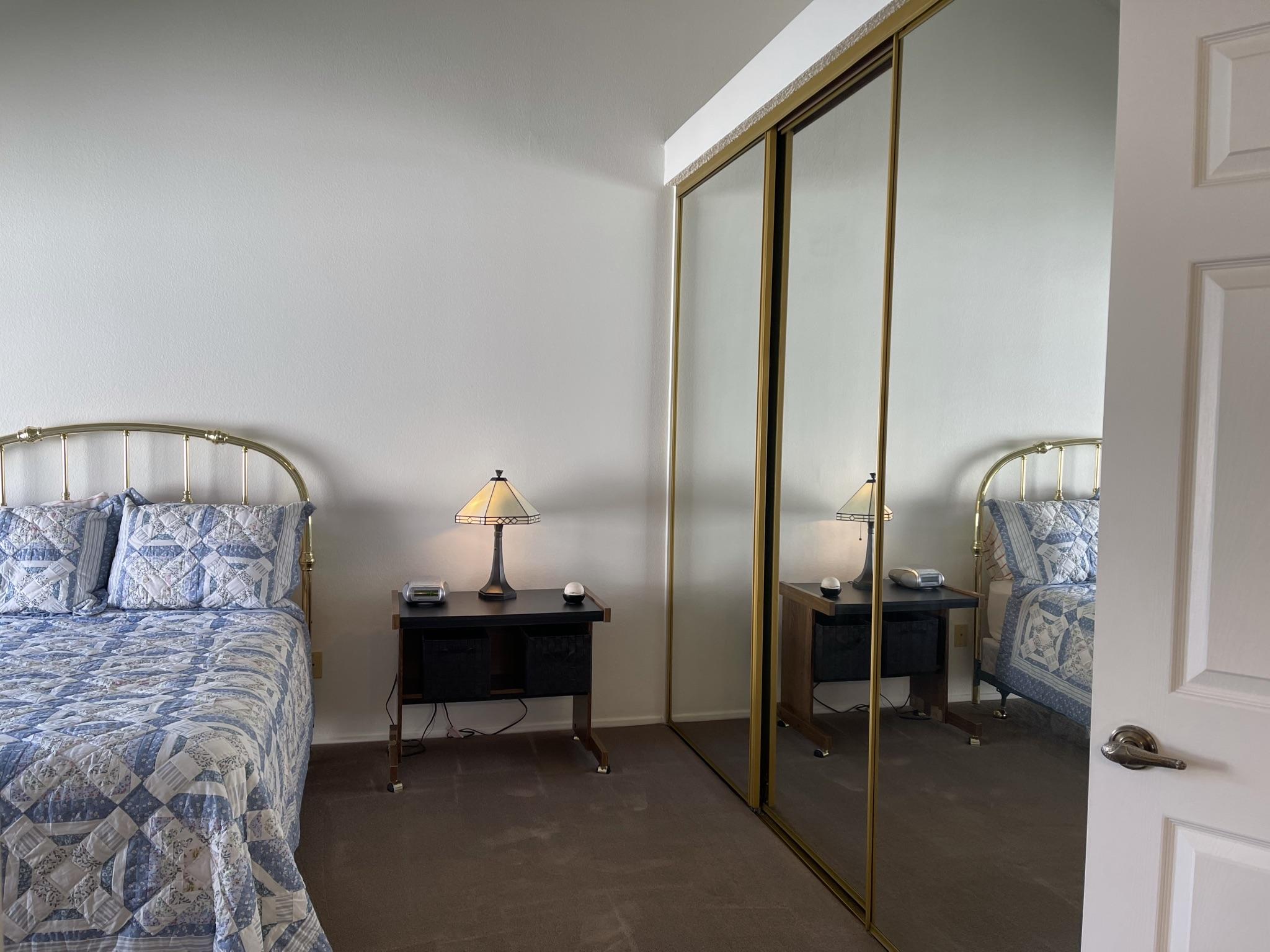 9661 Northampton Drive Rancho Cucamonga, CA 91737 - Photo 17 of 27 a bedroom with a bed and a mirror