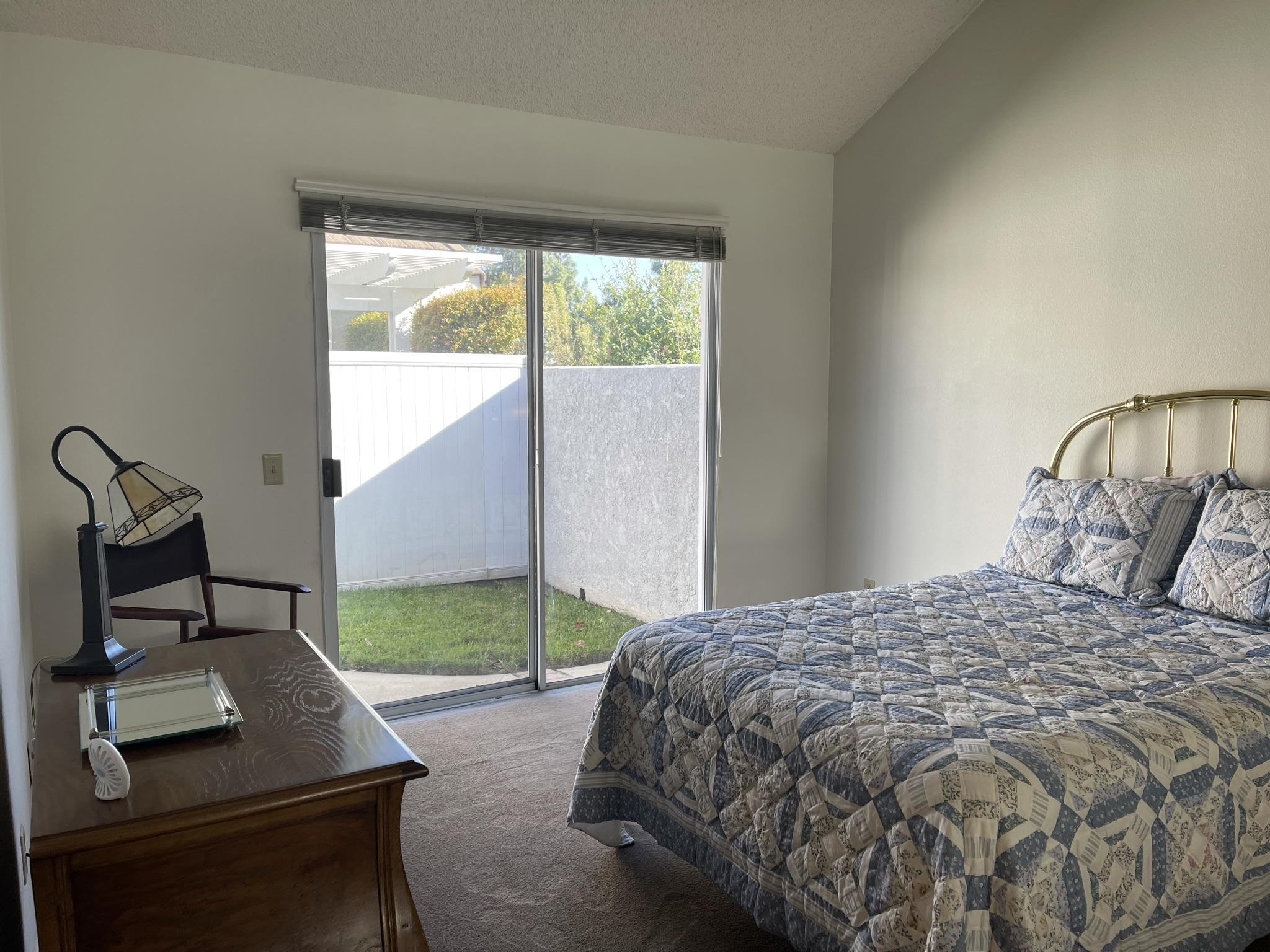 9661 Northampton Drive Rancho Cucamonga, CA 91737 - Photo 18 of 27 a bedroom with a bed and a window