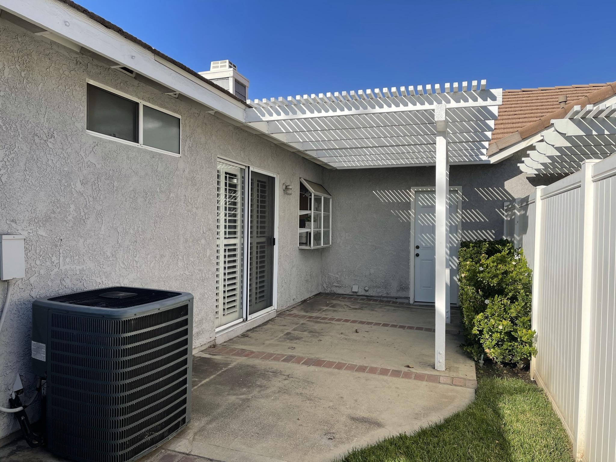 9661 Northampton Drive Rancho Cucamonga, CA 91737 - Photo 21 of 27 a front view of a house