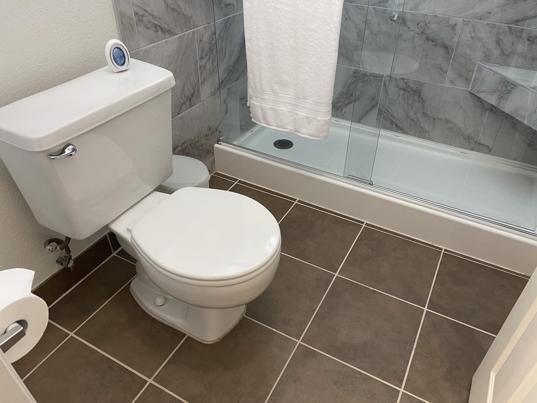9661 Northampton Drive Rancho Cucamonga, CA 91737 - Photo 23 of 27 a bathroom with a toilet and a shower