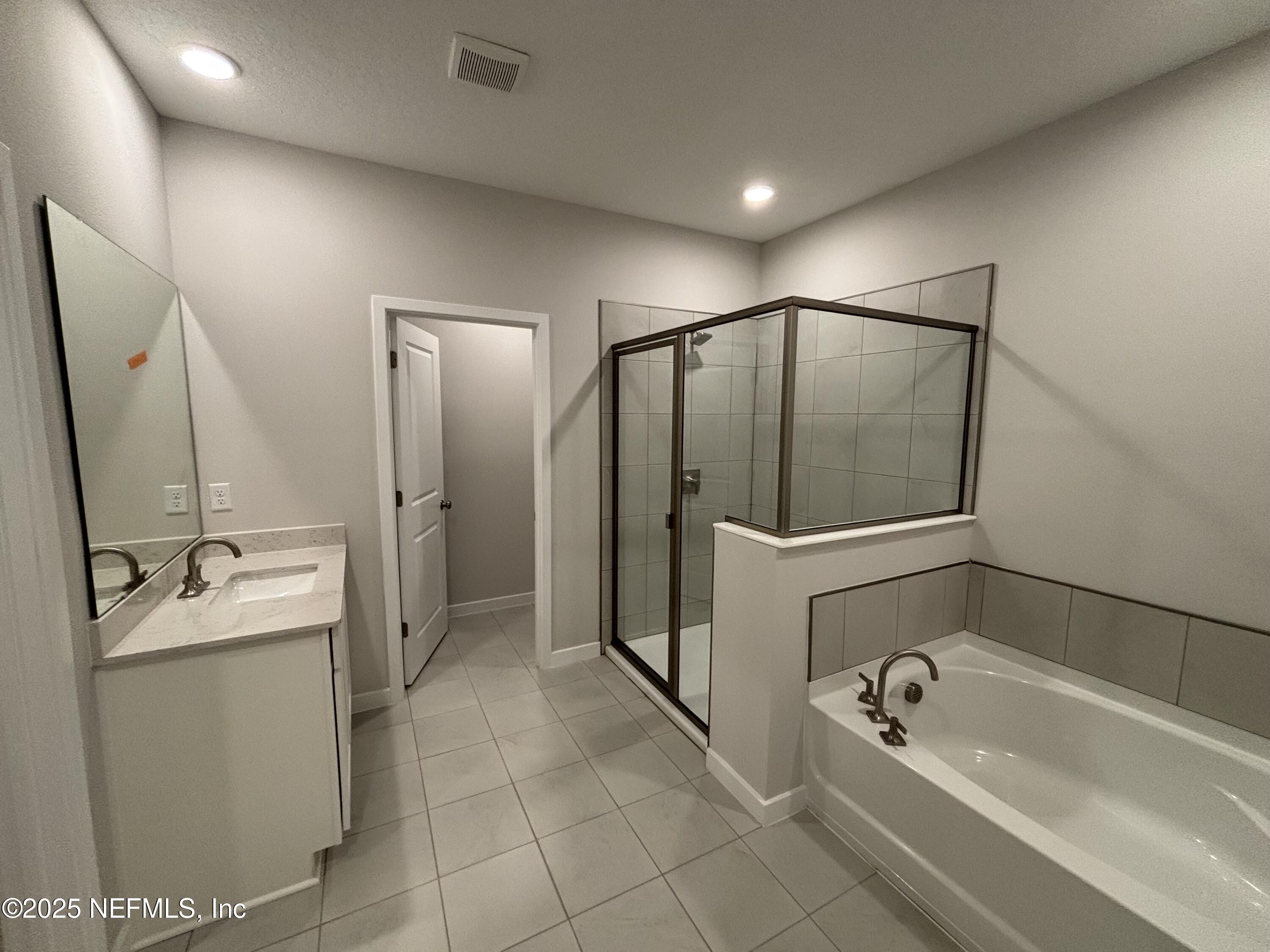 71 Pegasus Road Flagler Beach, FL 32136 - Photo 23 of 25 a bathroom with a bathtub and a sink
