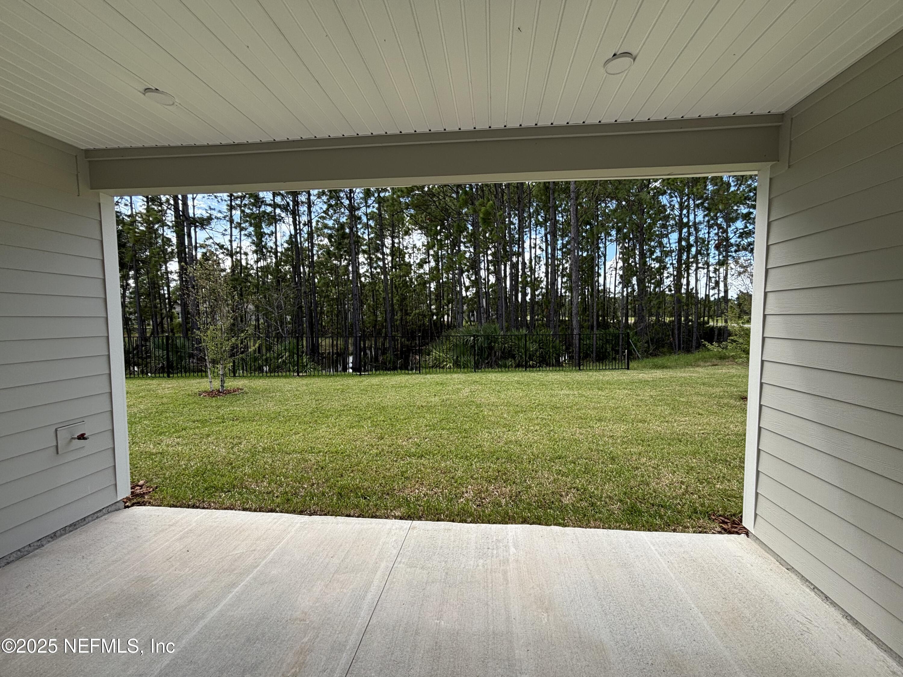 71 Pegasus Road Flagler Beach, FL 32136 - Photo 25 of 25 a view of backyard with large trees