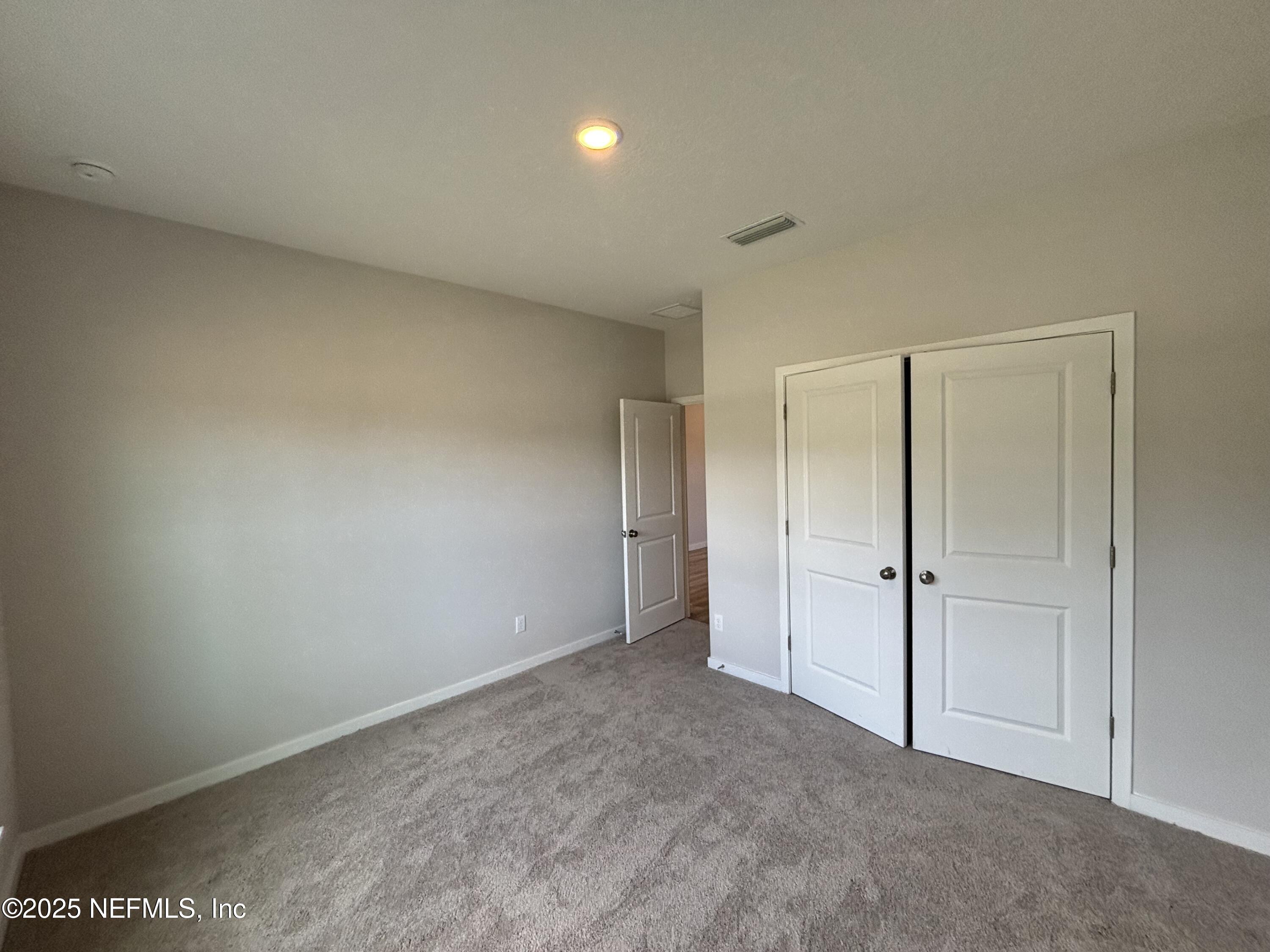 71 Pegasus Road Flagler Beach, FL 32136 - Photo 6 of 25 a view of an empty room