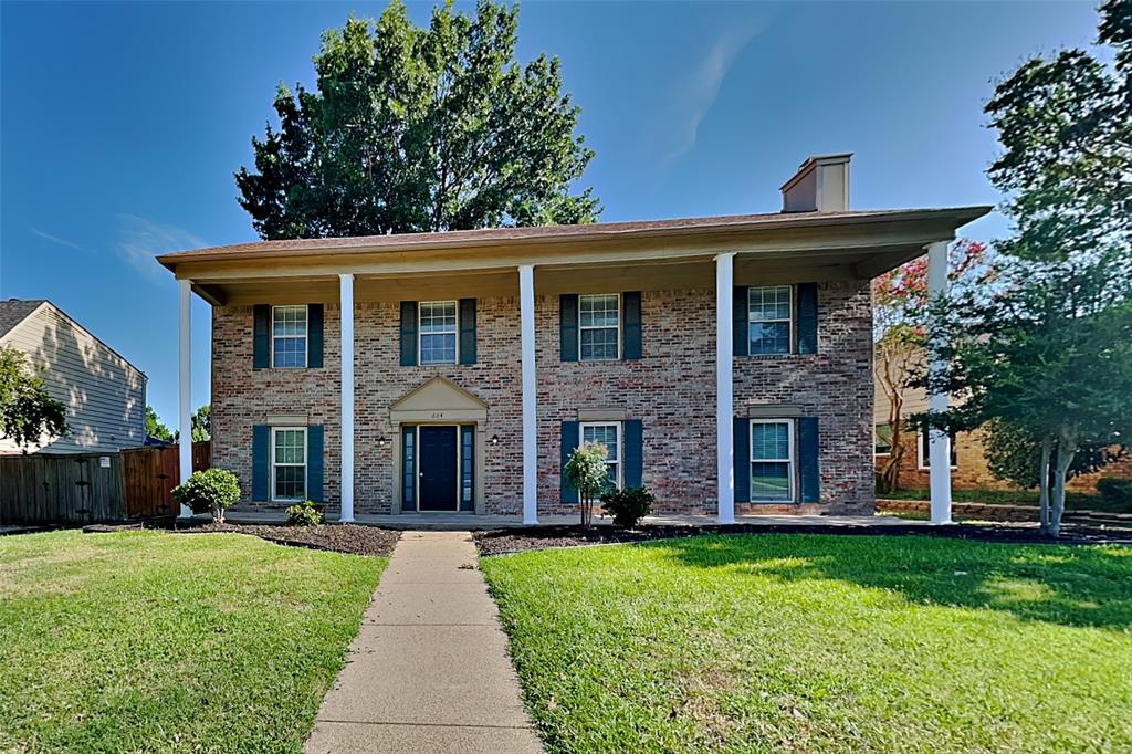 604 Ashby Place Allen, TX 75002 - Photo 1 of 21 a front view of a house with garden