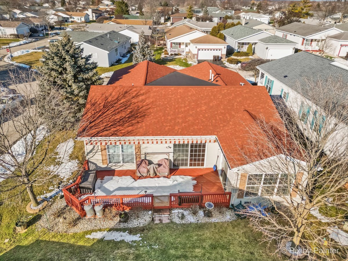 1 Suffolk Way Grayslake, IL 60030 - Photo 11 of 54 an aerial view of a house with swimming pool patio and lake view