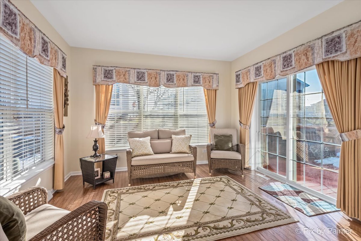1 Suffolk Way Grayslake, IL 60030 - Photo 25 of 54 a living room with furniture and a large window