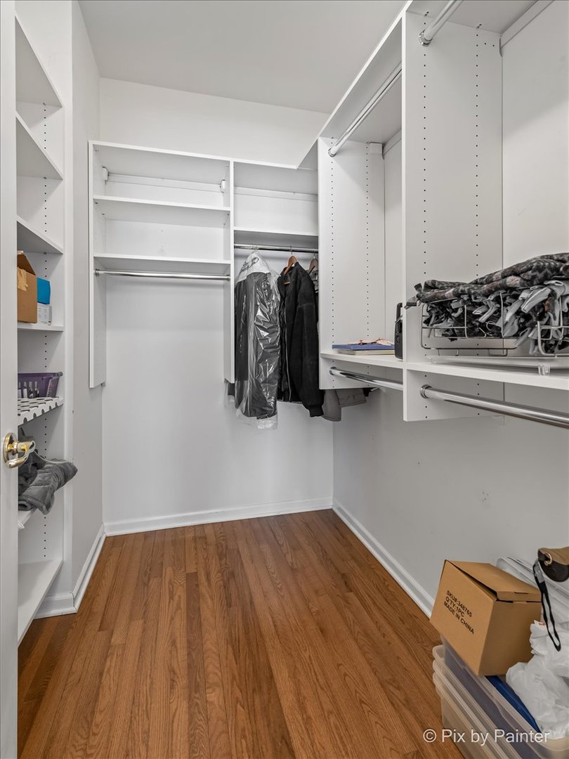 1 Suffolk Way Grayslake, IL 60030 - Photo 29 of 54 a view of walk in closet with clothes and shoes