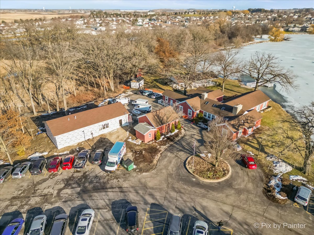 1 Suffolk Way Grayslake, IL 60030 - Photo 46 of 54 an aerial view of a house with parking space